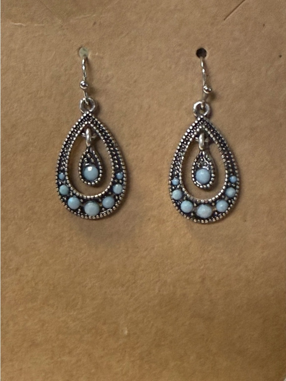 Silver Teardrop Dangle Earrings with Light Blue Stones